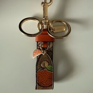 Coach Orange and Gold Keychain